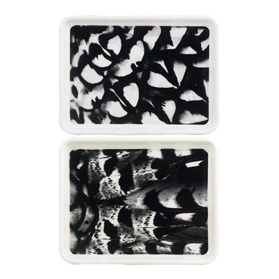 Two small assorted butter trays
